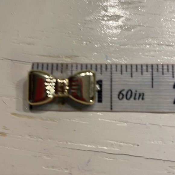 5/8” gold tone bow tie charm/pendant with double sided jump hoop - Picture 9 of 10